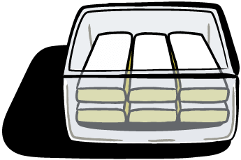 A glass tupperware of lemon bars.